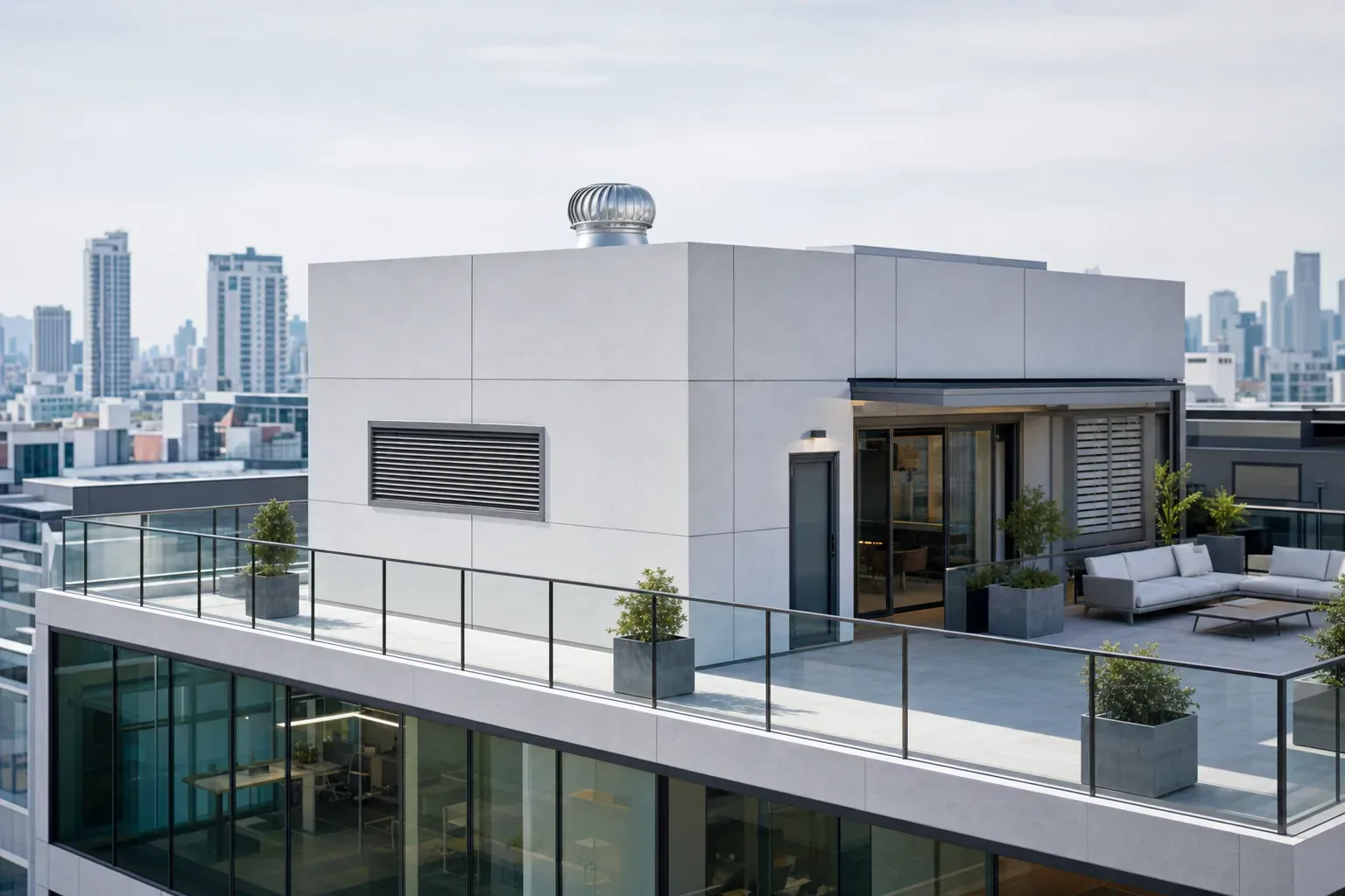 Commercial rooftop with a wind-driven ventilator.